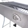 A close-up, angled view of a stainless steel charcoal grill with a diamond plate texture on its side. Produktbild-Vorschau