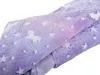 A close-up, folded view of a soft blanket with a unicorn and star pattern. Anteprima dell’immagine prodotto