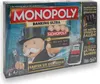 The image shows the front of a Monopoly Banking Ultra board game box, featuring the game's mascot and key elements of the game. Produktbild-Vorschau