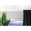 A close-up view of a white curtain rail mounted on a wall above a window, with a black curtain partially drawn. Produktbild-Vorschau