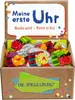 A box filled with colorful wooden watch toys, with the product title and brand name visible on the packaging. Produktbild-Vorschau