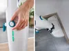 A collage of two images showing a steam mop. The left image shows a hand adjusting a dial on the mop's handle, with illuminated power and steam indicators. The right image shows the mop head cleaning a corner of a floor next to a wall baseboard. Náhled obrázku produktu