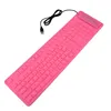 A pink silicone keyboard with a USB cable is shown against a white background. Podgląd zdjęcia produktu