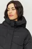 A close-up shot of a woman wearing a black puffer coat. Produktbild-Vorschau