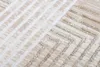 A close-up view of a textured rug with a geometric pattern. Produktbild-Vorschau