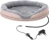 A heated pet bed with its power adapter and cord. Produktbild-Vorschau