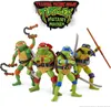 Four Teenage Mutant Ninja Turtles action figures standing together, with the movie title logo above them. Anteprima dell’immagine prodotto