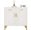 A white sideboard with gold handles and legs, decorated with a diffuser and a small radio on top. Produktbild-Vorschau