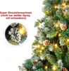 A close-up of a decorated artificial Christmas tree with lights and snow-like flocking, with a circular inset showing a detailed view of a snowy branch and pinecone. Produktbild-Vorschau
