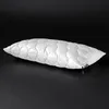 A white pillow is shown on a black background. Produktbild-Vorschau