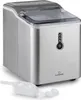 A silver ice maker with a clear lid and control panel, shown with an ice scoop and ice cubes in front of it. Náhľad obrázku produktu