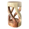 A carved wooden stool on a white background. Anteprima dell’immagine prodotto