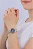 A woman's wrist wearing a watch. Produktbild-Vorschau