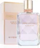 A perfume bottle and its packaging are displayed against a white background. Voir les images du produit