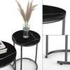 A set of two round side tables with black marble tops and metal legs, displayed on a white background. Náhľad obrázku produktu