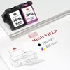 Two ink cartridges are shown on a stack of paper, with a diagram of a printer below. Produktbild-Vorschau