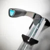 A close-up shot of the handle and part of the frame of a cutting tool. Produktbild-Vorschau