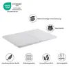 A white foldable mattress is shown with various icons and text describing its features. Produktbild-Vorschau