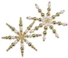 Two snowflake-shaped ornaments made of beads. Produktbild-Vorschau