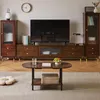 A living room scene featuring a TV stand, two display cabinets, and a coffee table. Náhled obrázku produktu
