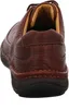 A close-up rear view of a brown leather shoe. Anteprima dell’immagine prodotto