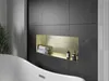 A modern bathroom with a bathtub and a built-in shelf. Voir les images du produit