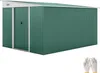 A green metal garden shed with a sloped roof and double doors, presented on a white background. A pair of white gloves with yellow cuffs is visible in the bottom right corner. Podgląd zdjęcia produktu