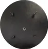 The underside of a black circular device with four small protrusions and a central circular fitting. Produktbild-Vorschau