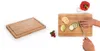 A split image showing a bamboo cutting board on the left and a person chopping zucchini on a similar cutting board with other ingredients on the right. Náhled obrázku produktu
