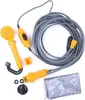 A portable 12V camping shower kit is laid out on a white background. Náhled obrázku produktu