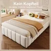 A bedroom scene featuring a bed without a headboard, with decorative pillows and a throw blanket. Náhľad obrázku produktu