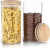 Two glass storage jars filled with pasta and coffee beans, with a bamboo lid placed next to one jar. Anteprima dell’immagine prodotto