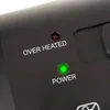 Close-up of a black electronic device with indicator lights and text labels. Produktbild-Vorschau