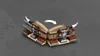 A LEGO® NINJAGO Drachen-Fänger 70654 set is shown on a gray background. Produktbild-Vorschau