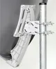 A close-up of a satellite dish mount attached to a pole. Náhled obrázku produktu
