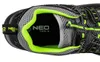 A close-up view of the interior of a black and gray work shoe with bright green trim. Podgląd zdjęcia produktu