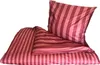 A set of bedding with a striped pattern. Produktbild-Vorschau