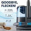 A cleaning device with text highlighting its features and a spilled cup of coffee on a carpet. Voir les images du produit