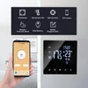A hand holding a smartphone displaying a thermostat app next to a wall-mounted smart thermostat. Náhled obrázku produktu