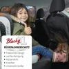 A child giving a thumbs up in a car, with a car seat protector on the back of the seat. Produktbild-Vorschau
