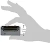 A hand is holding a small electronic device. Produktbild-Vorschau