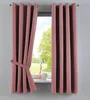 A pair of pink curtains tied back with a fabric tie, hanging in front of a window with a view of trees and grass. Produktbild-Vorschau