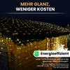 A wooden shed decorated with many warm white LED lights on the roof and eaves. Produktbild-Vorschau