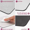 A collage of four images showcasing the features of a mousepad. Produktbild-Vorschau