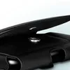 A close-up view of the inside of a black leather phone case with a belt clip. Produktbild-Vorschau