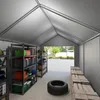 Interior view of a storage tent or garage with shelves filled with storage bins, boxes, and a tire. Náhled obrázku produktu