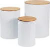 Three white storage canisters with wooden lids are arranged on a white background. Produktbild-Vorschau
