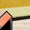 Close-up view of the corner of a rug, showing the texture and underside. Produktbild-Vorschau