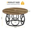 A diagram showing the dimensions of a round coffee table with a wood-grain top and a black metal base. Podgląd zdjęcia produktu