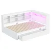 A white corner bed frame with integrated shelving and LED lighting. Produktbild-Vorschau